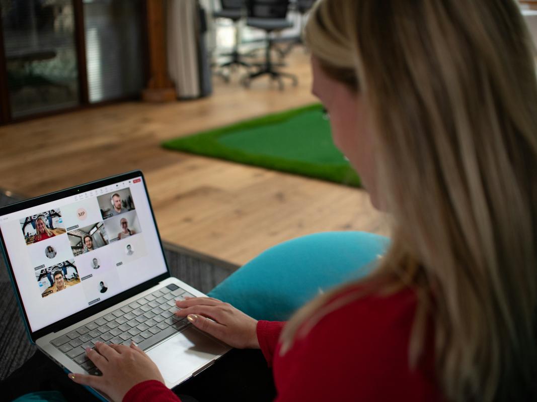Female looking at a computer screen with an online tutorial